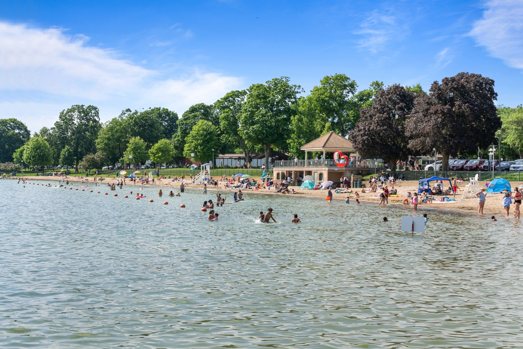 Lake Geneva public beach with the historic pavilion in summer